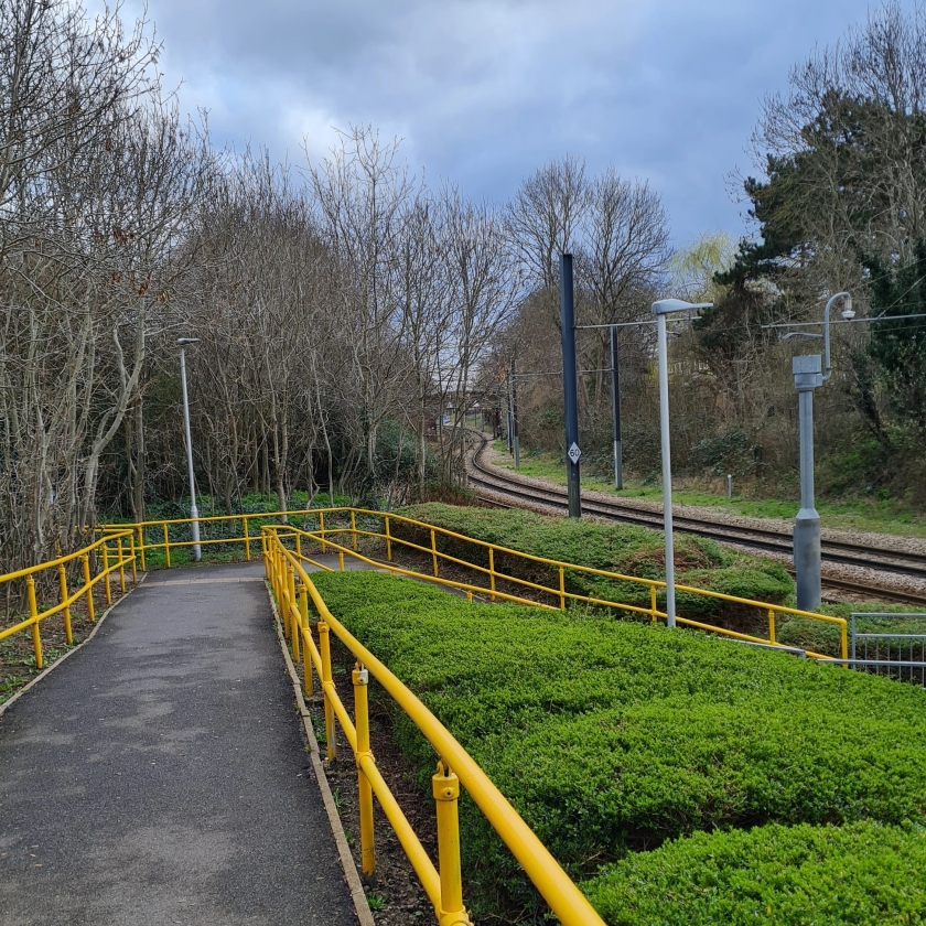Blackhorse Lane tram stop, which marks the site where the line branched off to Addiscombe - the railway park which follows the branch is to the left of shot.